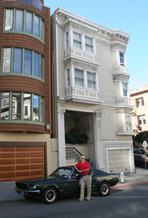 Lew and the Bullitt Mustang pay a reverent visit to the shrine of Frank Bullitt’s apartment in San Francisco.  The shade of Steve McQueen smiled.